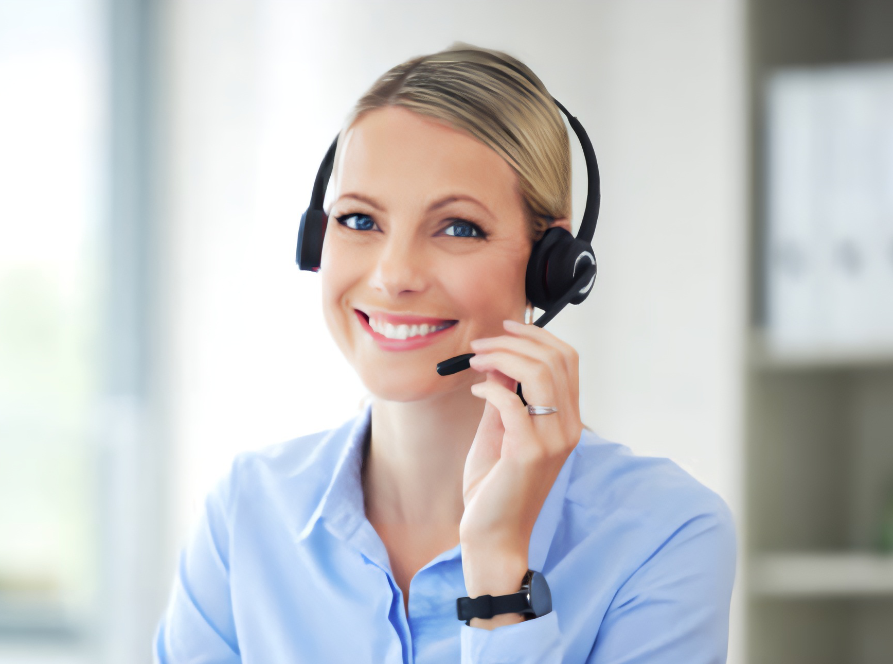 Smiling female flight agent wearing a headset